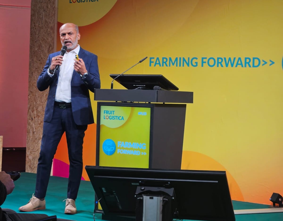 FarmERP CEO speaking on stage at Fruit Logistica